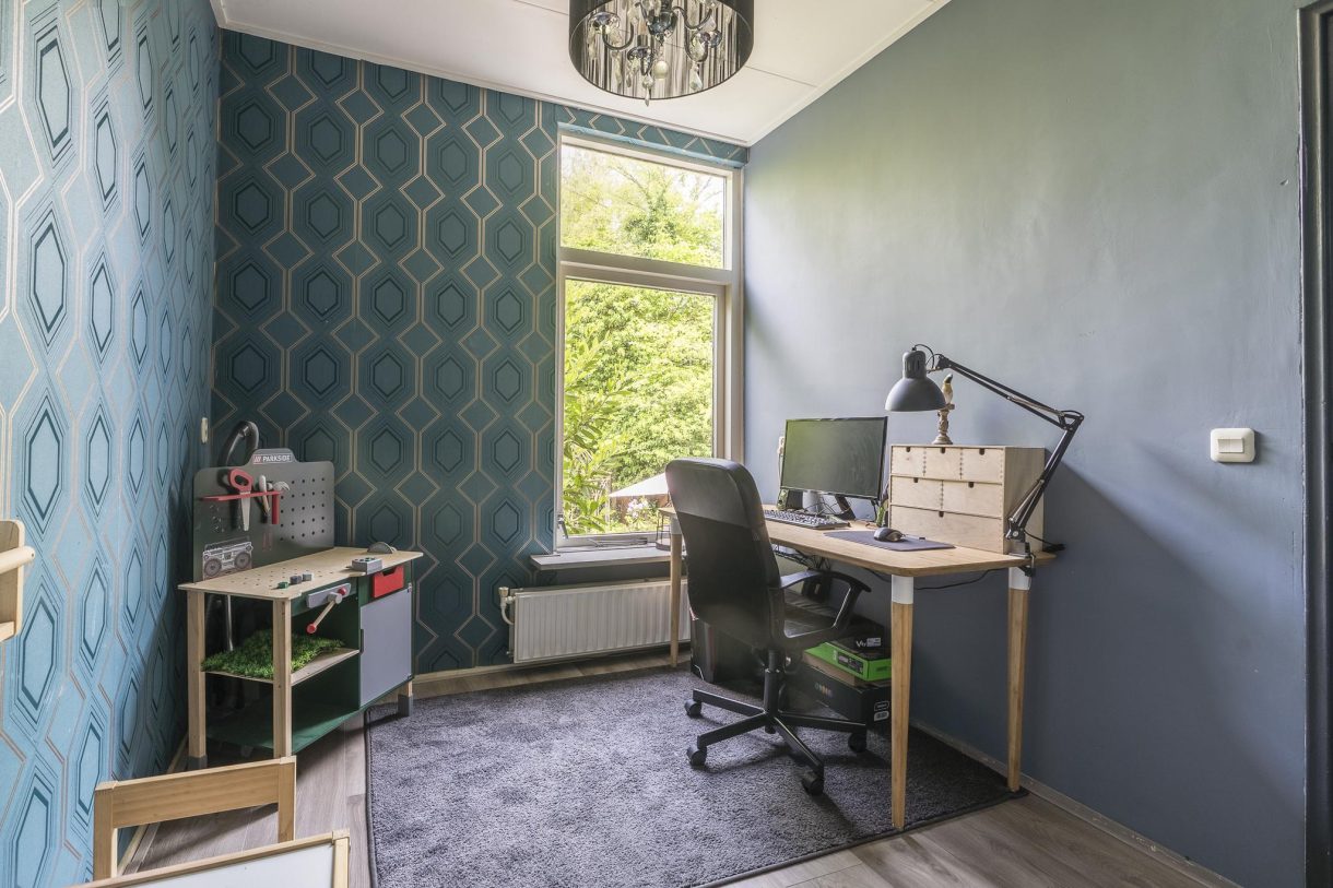 Te koop: Foto Woonhuis aan de Stationsweg 15 in Hoogezand