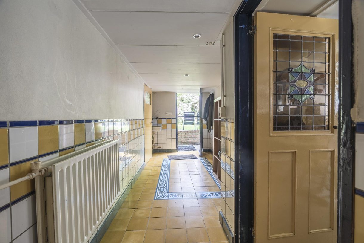 Te koop: Foto Woonhuis aan de Stationsweg 15 in Hoogezand