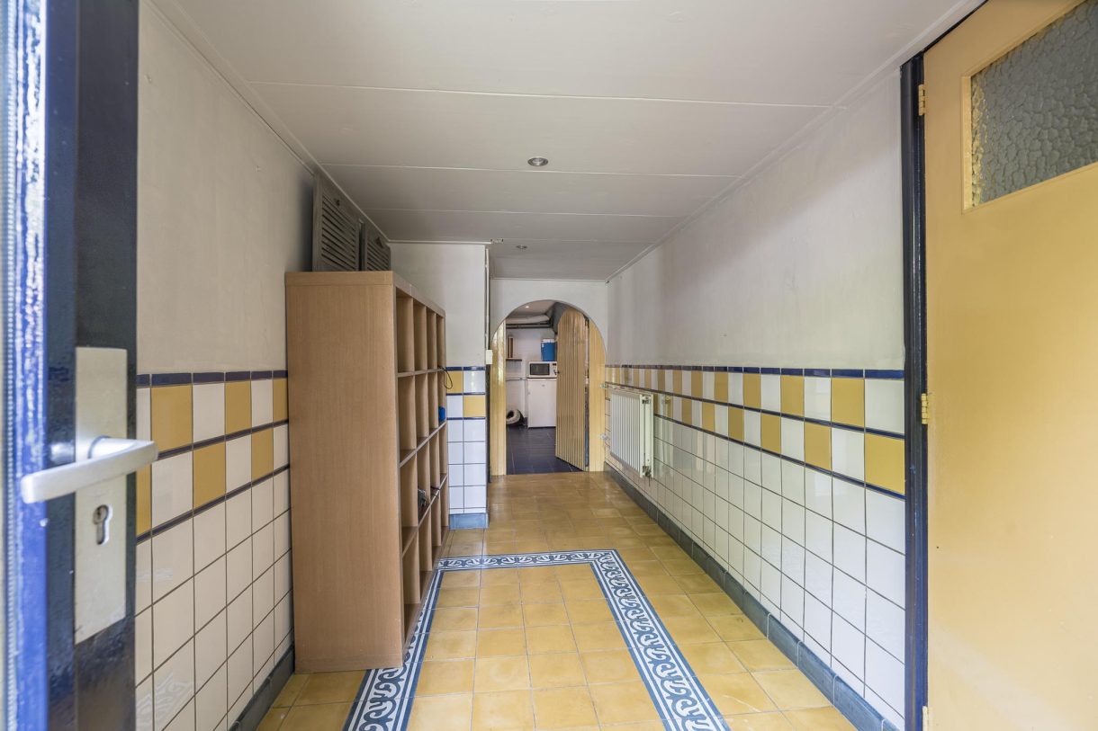 Te koop: Foto Woonhuis aan de Stationsweg 15 in Hoogezand