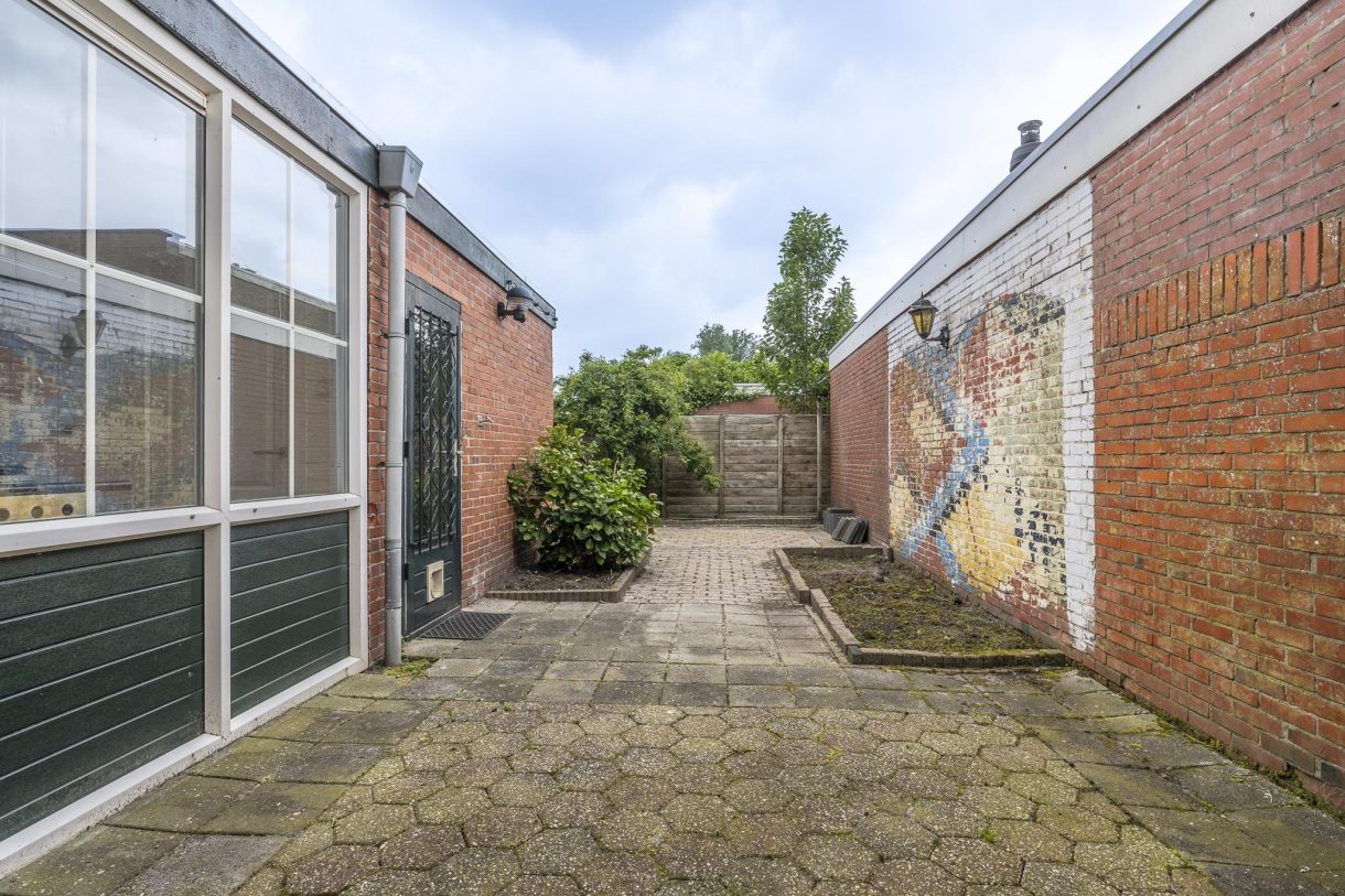 Te koop: Foto Woonhuis aan de Erasmusweg 27 in Hoogezand