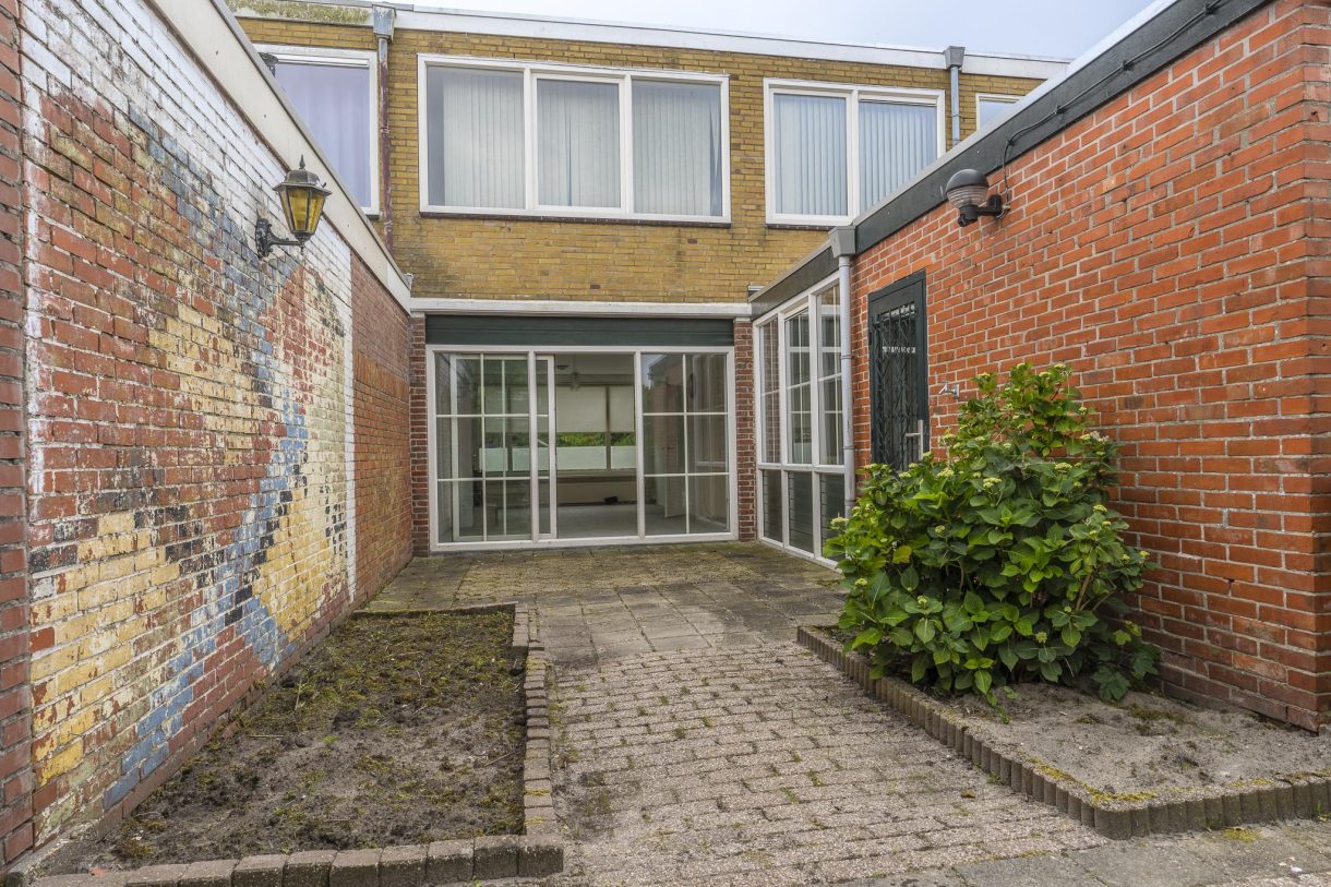 Te koop: Foto Woonhuis aan de Erasmusweg 27 in Hoogezand