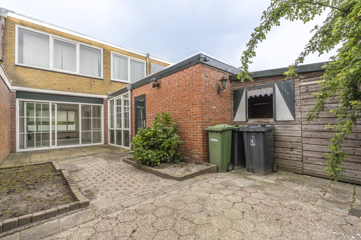 Te koop: Foto Woonhuis aan de Erasmusweg 27 in Hoogezand