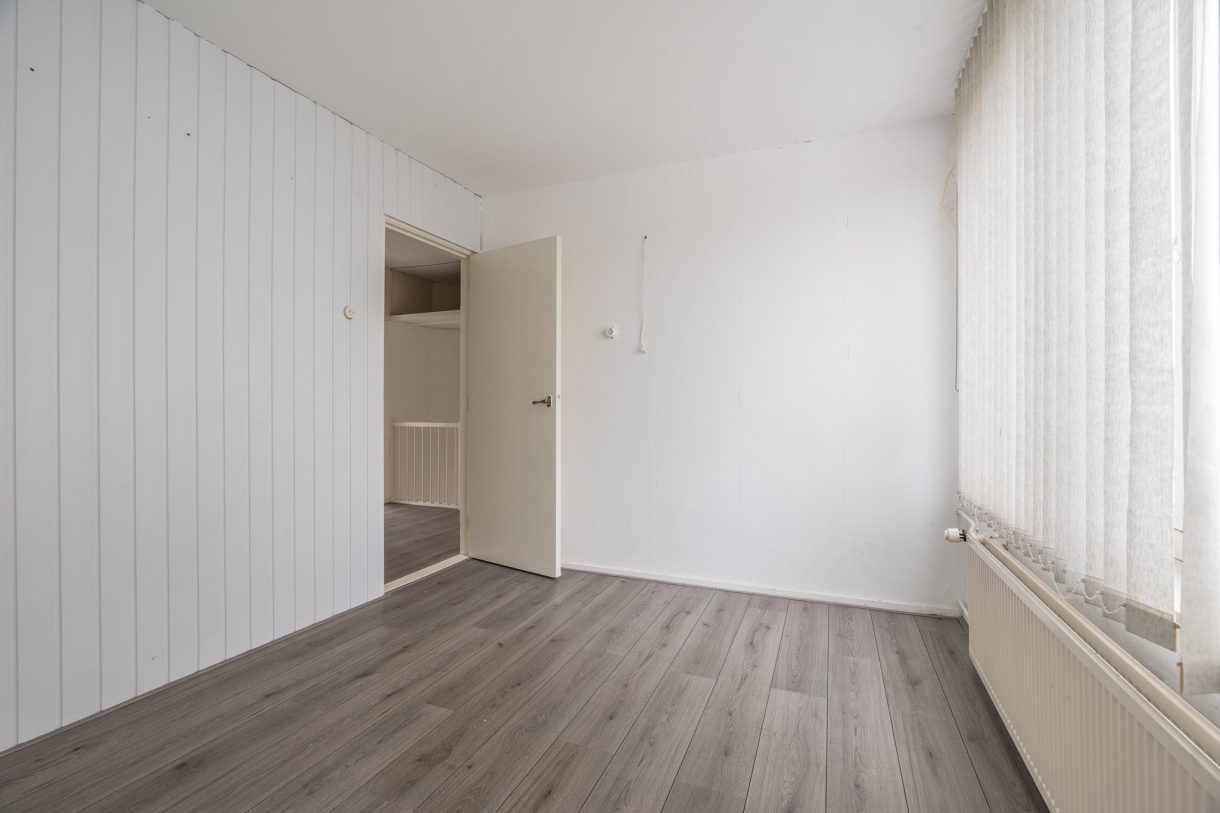 Te koop: Foto Woonhuis aan de Erasmusweg 27 in Hoogezand