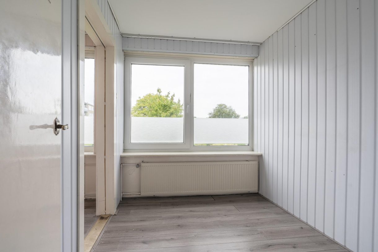 Te koop: Foto Woonhuis aan de Erasmusweg 27 in Hoogezand