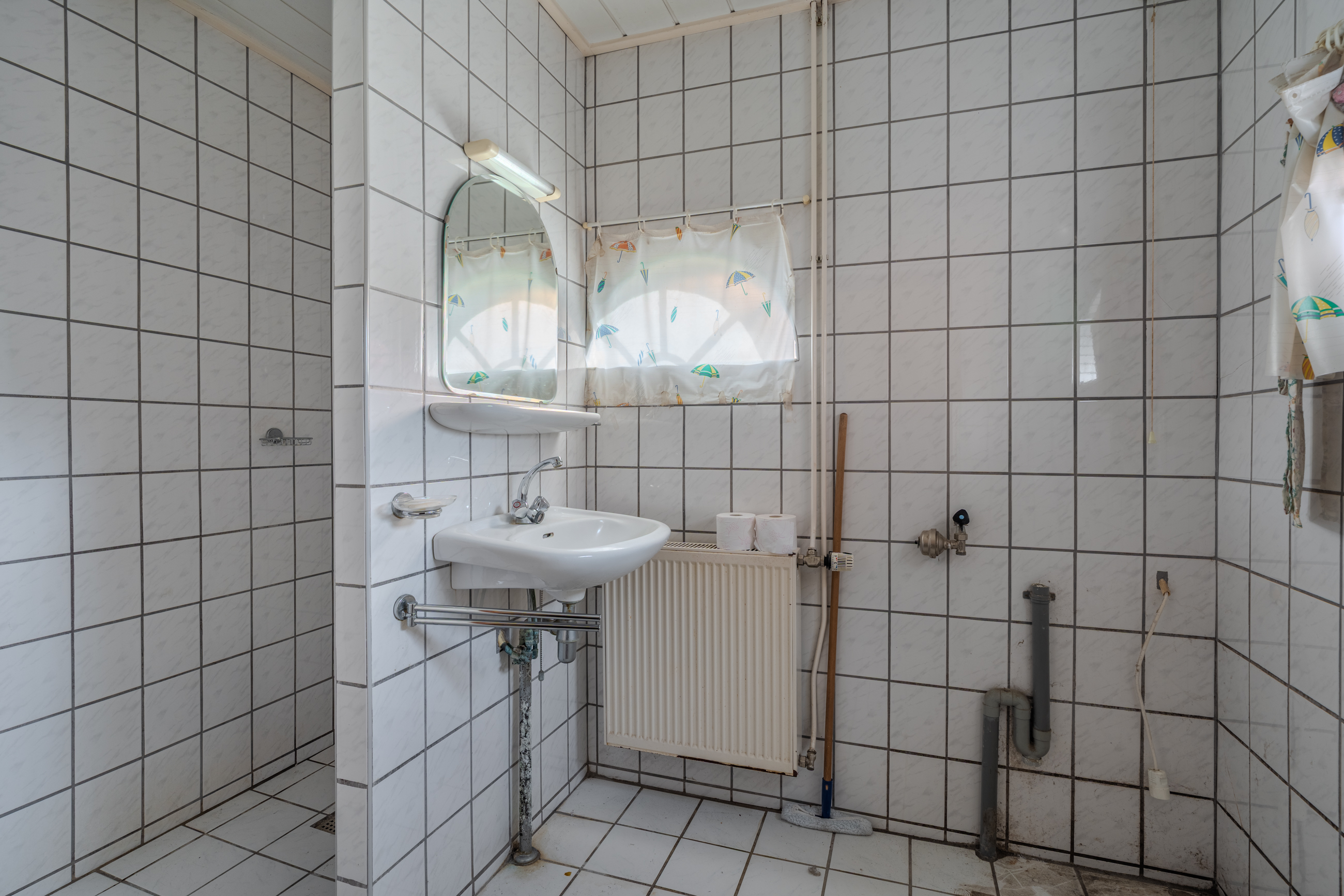 Te koop: Foto Woonhuis aan de Hoofdstraat 112 in Hoogezand